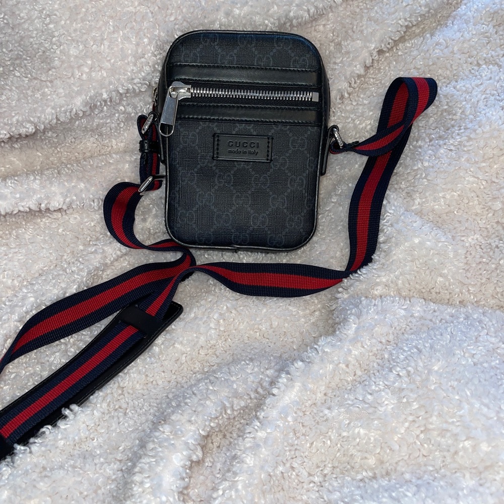 Authentic Gucci messenger bag in black GG Monogram